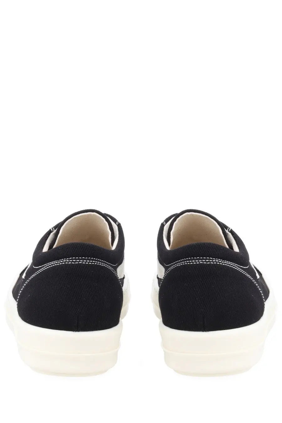 Drkshdw men’s black canvas laceless slip-on sneakers with white rubber soles and contrasting white stitching