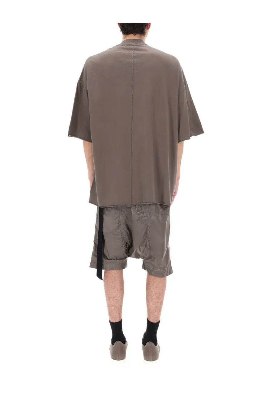 Back view of drkshdw men’s loose-fitting oversized olive-green short-sleeved shirt with central seam