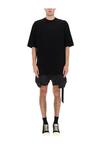 Black oversized short-sleeved t-shirt with relaxed fit and asymmetrical hemline from DRKSHDW men’s collection