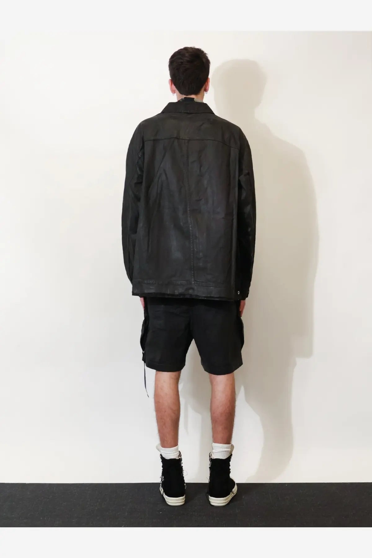Drkshdw men’s waxed black denim jacket in black leather with classic collar and visible stitching details