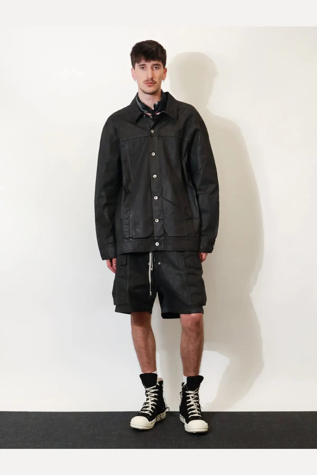 Drkshdw men’s waxed black denim utility jacket with button closures and multiple pockets