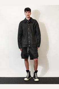 Drkshdw men’s waxed black denim utility jacket with button closures and multiple pockets
