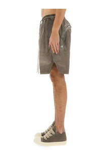 Drkshdw men’s zippered boxer shorts in beige with gray distressed denim and drawstring waist and side zipper pockets