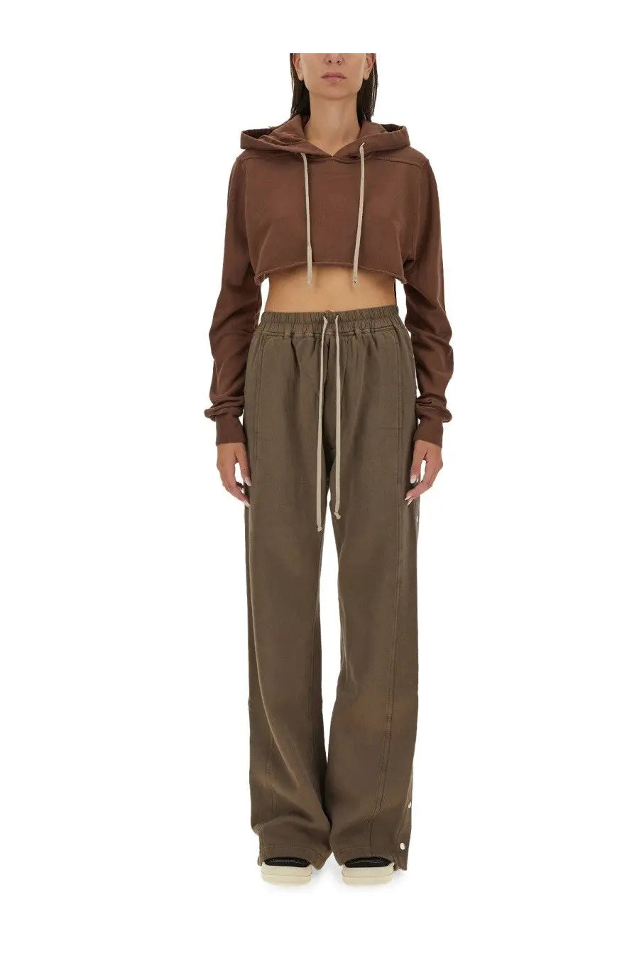 Drkshdw women’s brown cropped hoodie with matching drawstrings paired with olive green wide-leg pants with pockets and buttons