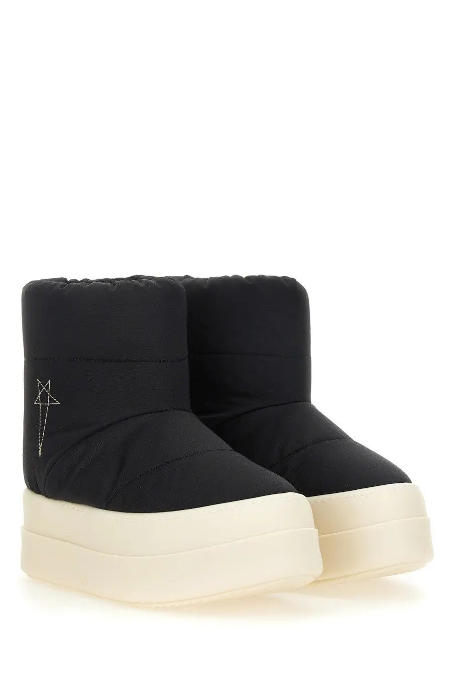 Drkshdw women’s padded black puffer boots with cream platform sole and subtle embroidered logo on the side