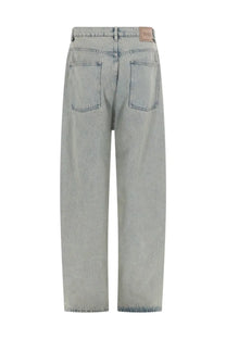 Drôle de Monsieur men’s grey light-wash denim baggy fit jeans with relaxed wide-leg cut and brown leather patch