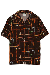 Dark brown short-sleeved button-up shirt with colorful orange green and silver walking cane print by drôle de monsieur