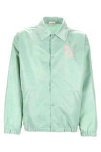 Mint green Drôle de Monsieur Giacca Slogan Palmiers coach jacket with pink embroidered logo on left chest