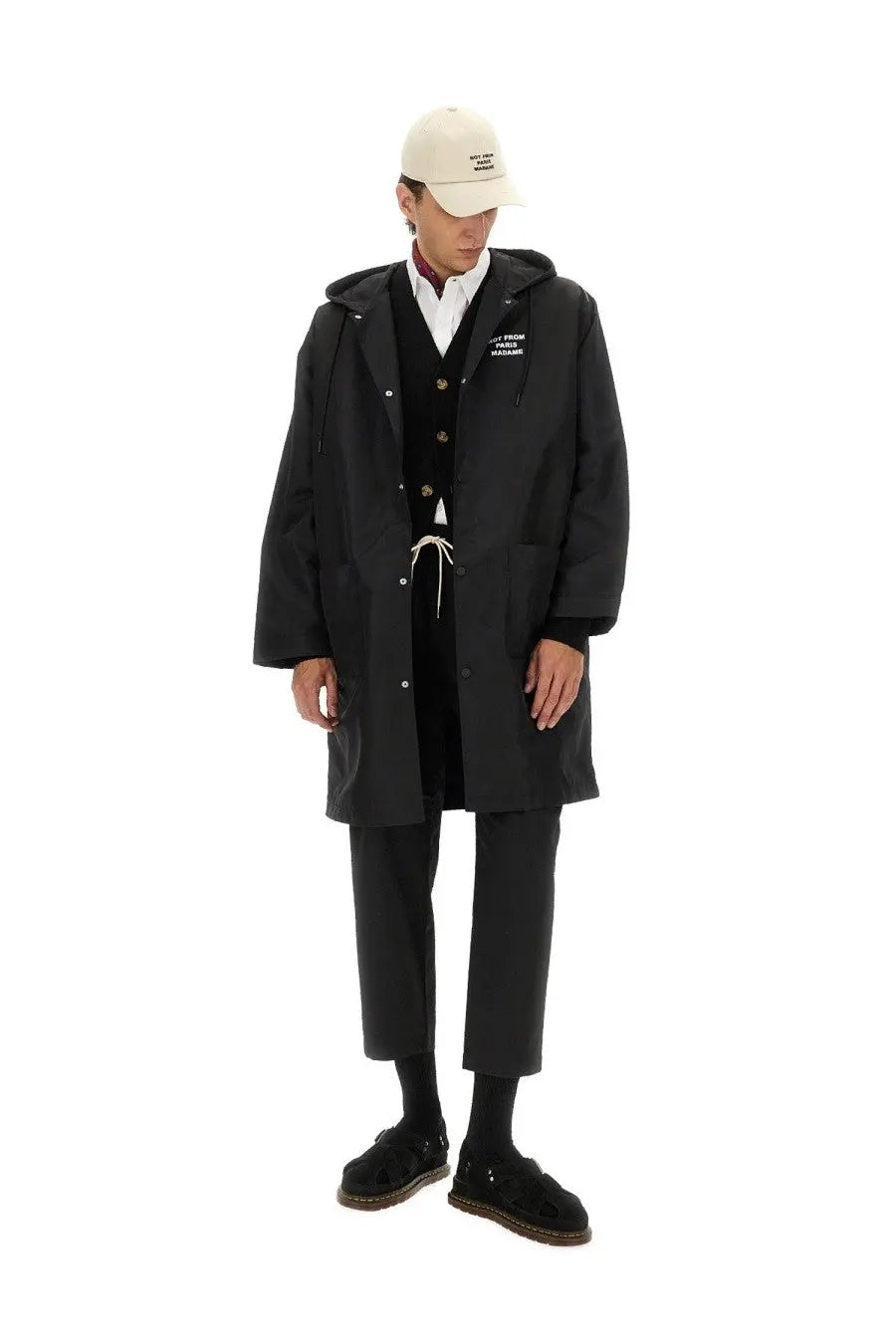 Drôle de Monsieur men’s black hooded parka with white button accents and drawstring waistband in trench coat style