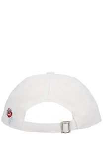 Drôle de Monsieur men’s LE white baseball cap with embroidered red rose and silver thread detailing and metallic buckle back