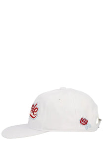 Drôle de Monsieur men’s white baseball cap with red embroidered love script and small rose emblem on the side