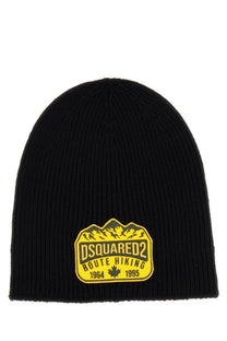 Dsquared2 men’s black ribbed knit beanie hat with yellow embroidered patch featuring hiking and mountain design
