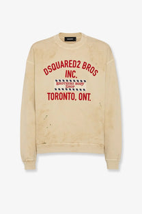 Beige Dsquared2 men’s cotton sweatshirt with faded red and black graphic print in casual style
