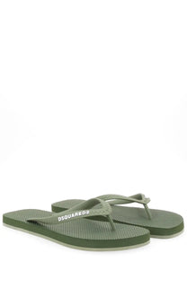 Dsquared2 men’s olive green rubber flip-flops with textured sole and white branding on the strap
