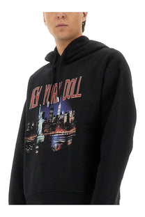 Dsquared2 men’s black hoodie featuring a vibrant new york skyline graphic in red white and blue tones