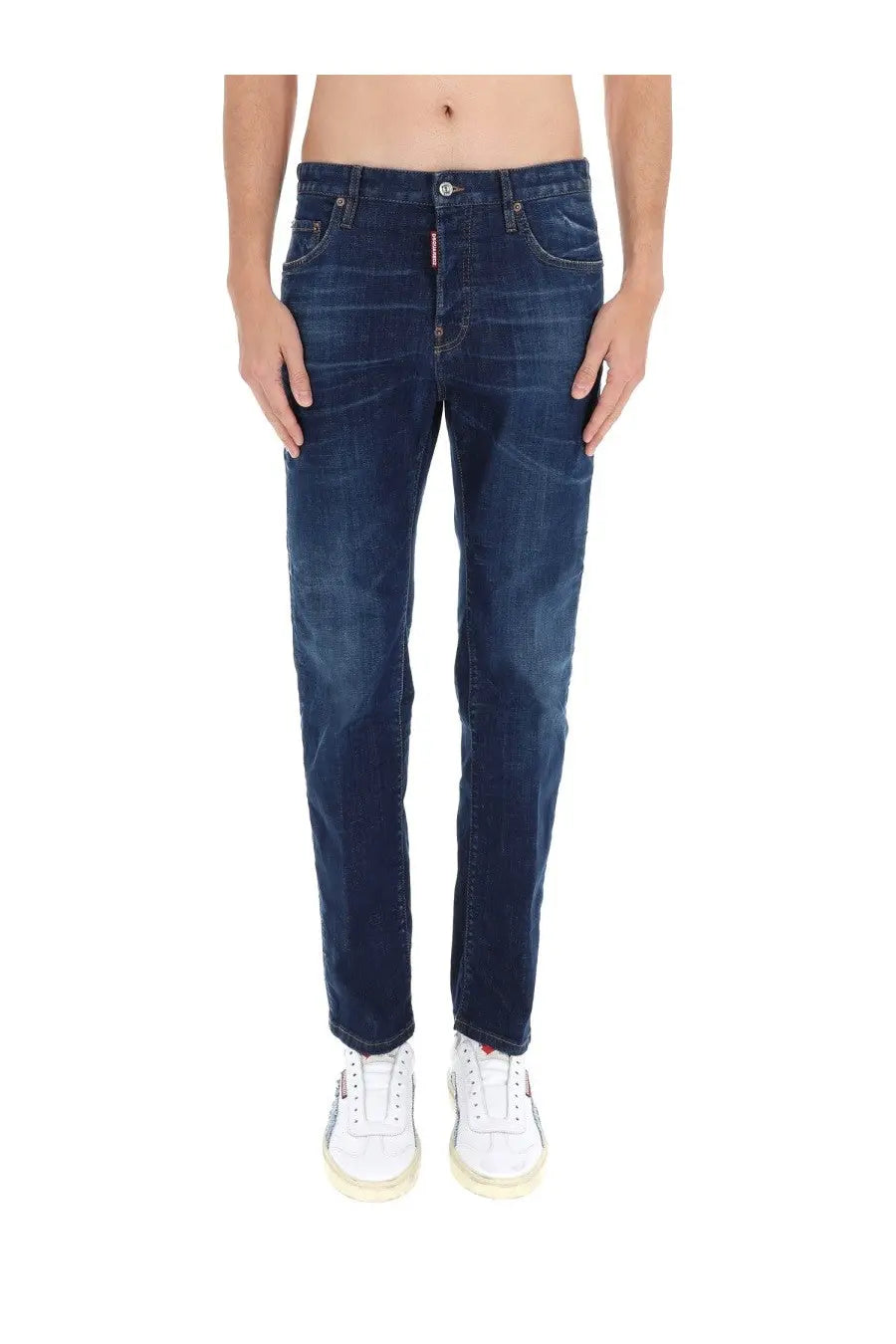 Dark blue slim fit denim jeans with subtle fading and dsquared2 logo on the front right pocket for men