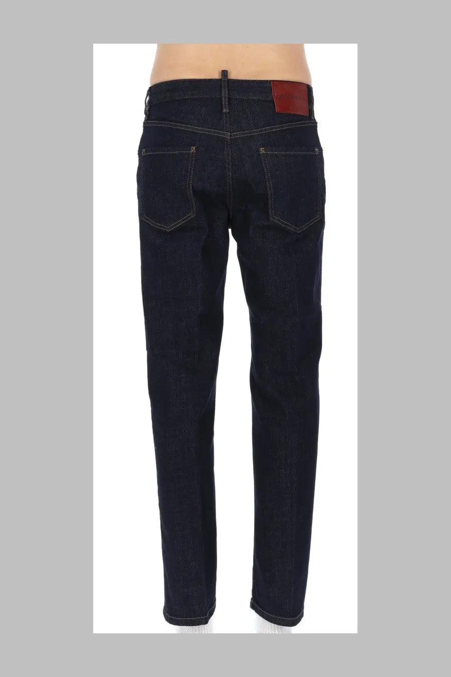 Dark indigo denim jeans with a red leather patch on the waistband dsquared2 men’s jeans teddy blue back side
