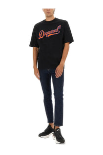 Dsquared2 men’s black t-shirt featuring an orange and pink cursive logo on the front