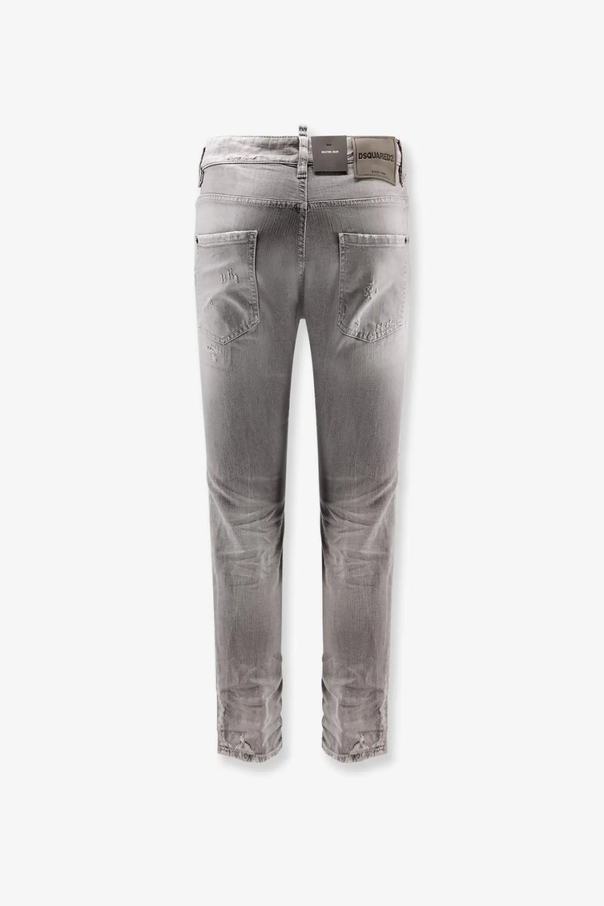 Back view of dsquared2 men’s skater jeans grey slim fit gray distressed denim with frayed cuffs and brand label