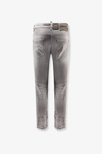 Back view of dsquared2 men’s skater jeans grey slim fit gray distressed denim with frayed cuffs and brand label