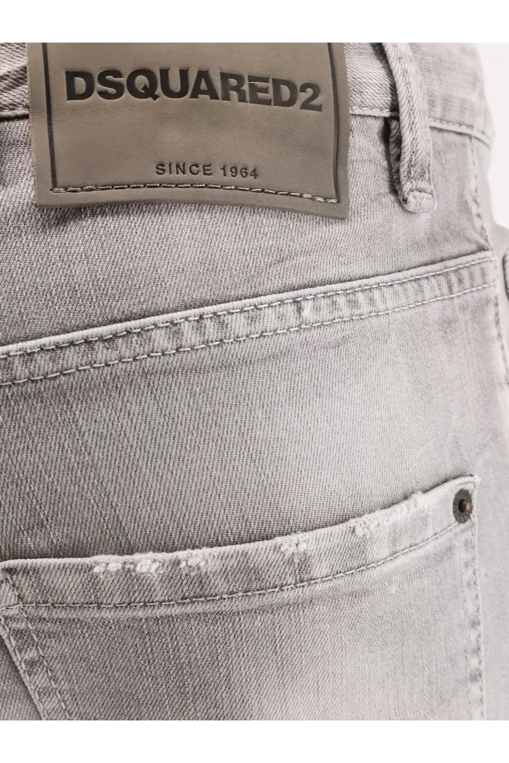 Light gray distressed denim dsquared2 men skater jeans featuring the brand label on the back side
