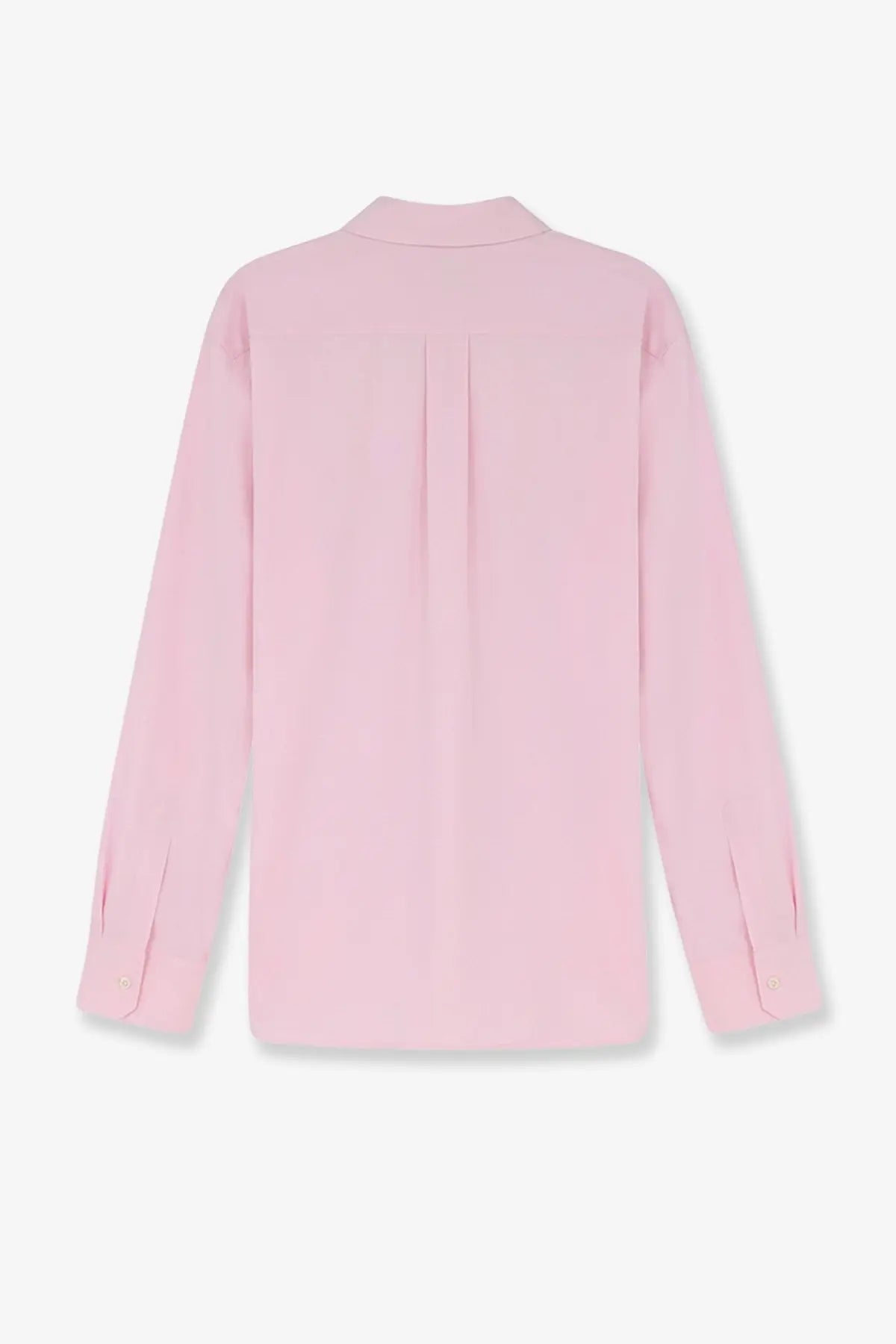 Dunst men’s unisex cotton shirt blue showing the back with a soft pink long-sleeved blouse and subtle pleats