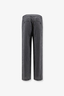 DUNST men’s unisex black pajama trousers with white grid pattern and wide-leg drawstring waistband