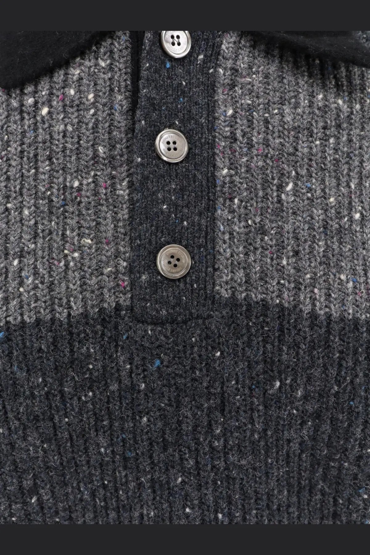 Dark gray chunky rugby wool blend sweater with textured knit and three silver toned buttons by DUNST unisex