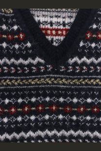 Dark navy knit v-neck sweater with intricate fair isle patterns in white red and beige by dunst unisex vest blue