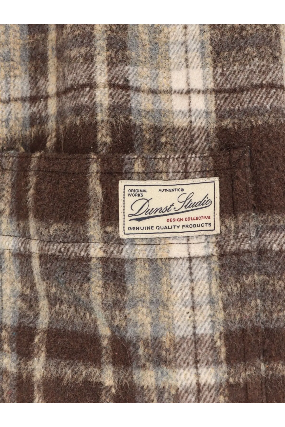 Brown and beige plaid flannel jacket with white dunst studio label featuring a unisex madras pattern design