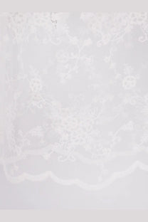 White lace fabric with delicate floral embroidery and scalloped edge from dunst women’s needlework layering skirt white