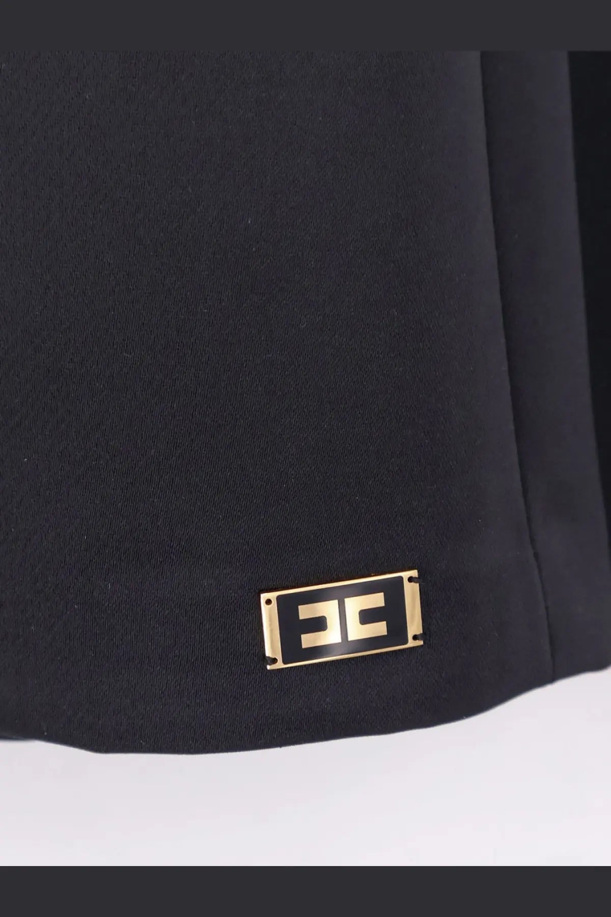 Elisabetta Franchi women’s daily satin mini dress in black with a rectangular gold-tone metal plaque embossed logo