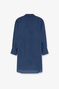 Eres women’s mignonette linen shirt blue shows the back with a subtle pleat and rolled cuffs on navy blue fabric