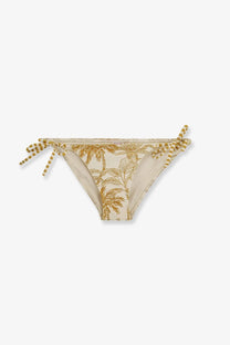 Beige nylon bikini bottom by Eres with gold palm tree print and striped tie-side strings, front view