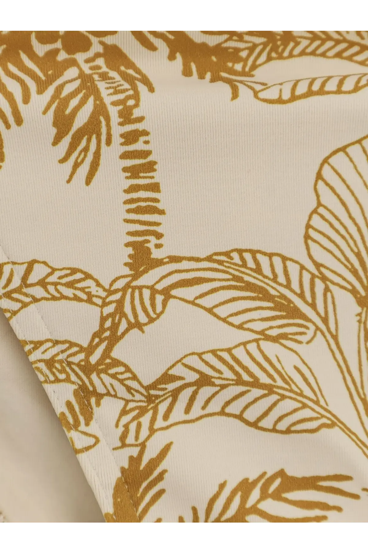 Eres women’s nylon bikini bottom gold with cream fabric and golden tropical palm tree and leaf pattern