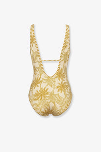 Eres women’s beige one piece swimsuit with gold palm leaf pattern and striped trim along straps and edges