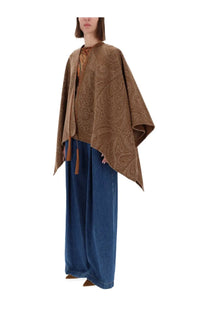 Etro women’s wool and cashmere cape in brown with paisley pattern and tassel details shown from the back side