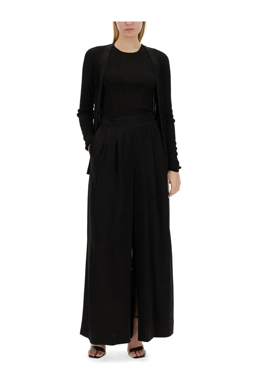 Fabiana Filippi women’s black ribbed knit cardigan paired with wide-leg trousers in a sleek minimalist design