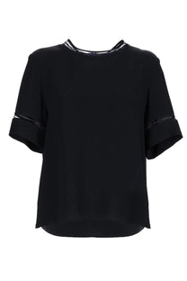 Fabiana Filippi women’s black silk blouse with subtle silver trim along neckline and sleeve cuffs