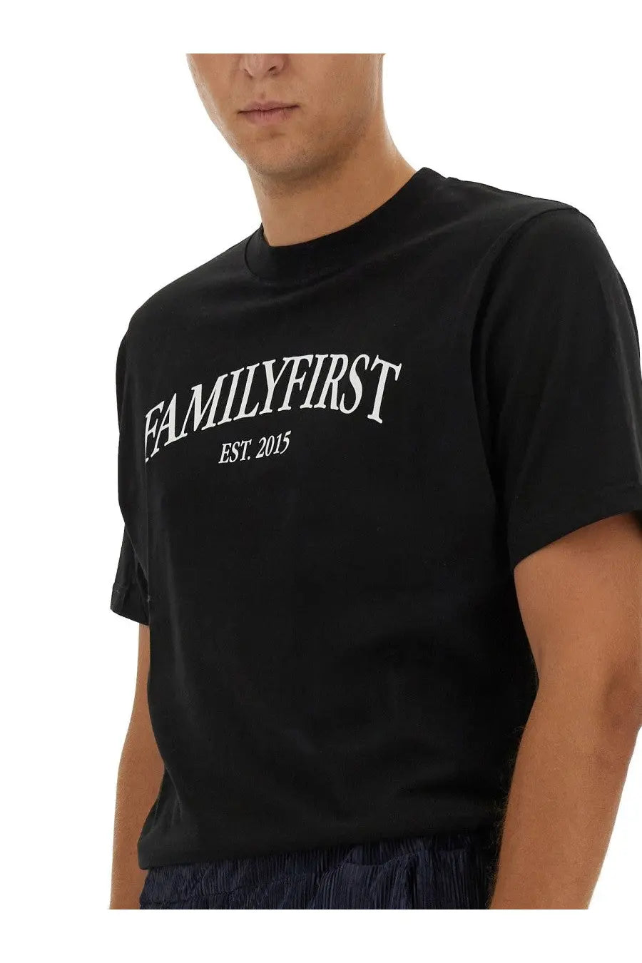 Black cotton family first men’s t-shirt featuring white familyfirst est print on the front