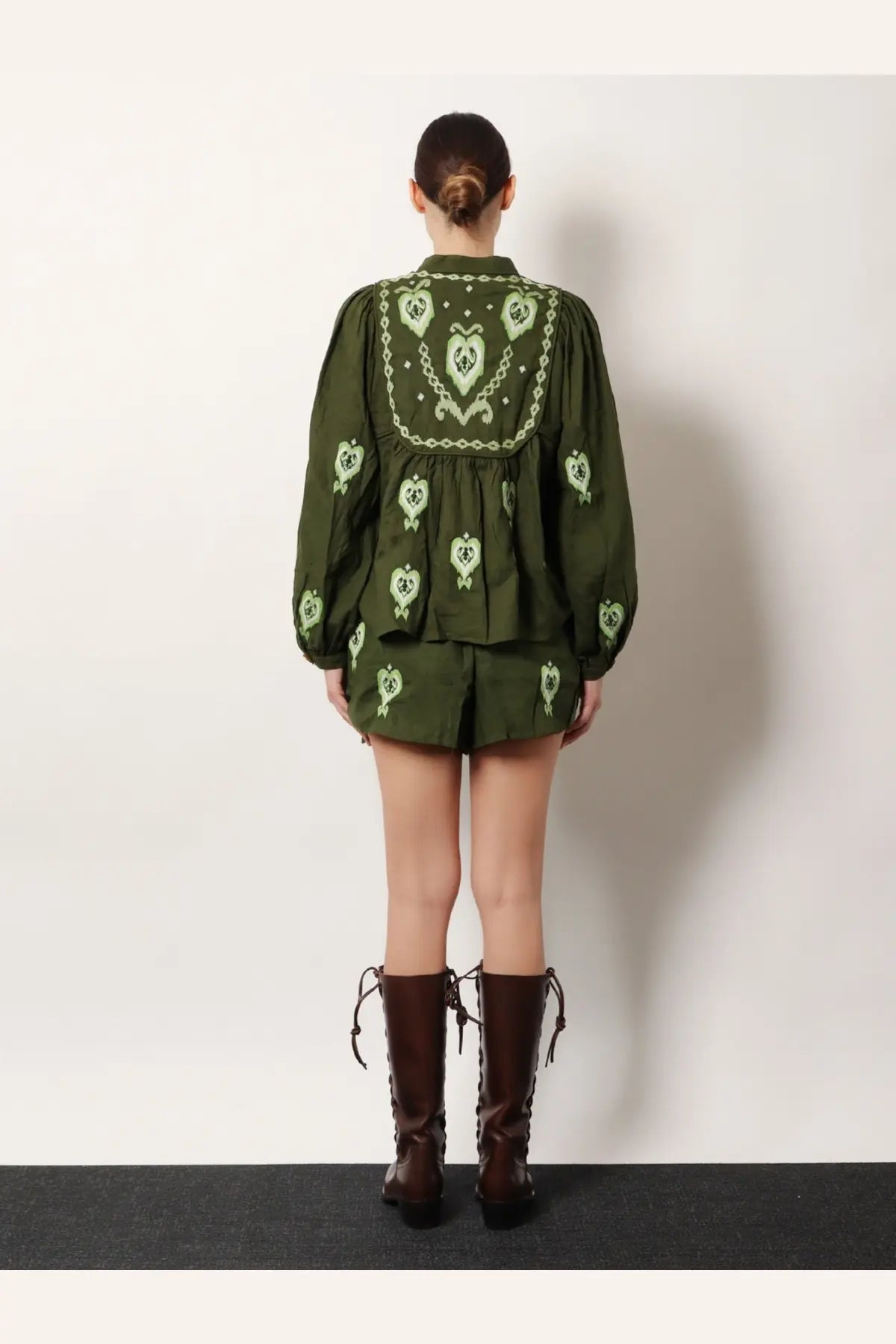 Olive green embroidered peasant blouse with heart and chain motifs from farm rio made with lenzing ecovero euroflax fabric