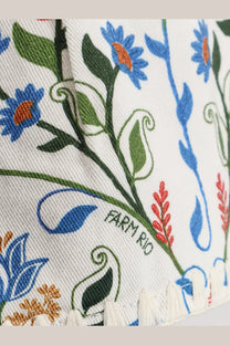 White cotton shorts with embroidered blue green and orange floral patterns and farm rio brand name visible