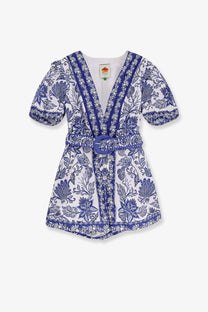 Farm rio women’s shell garden cotton jumpsuit white with blue floral print, short puffed sleeves, v-neckline, and belt