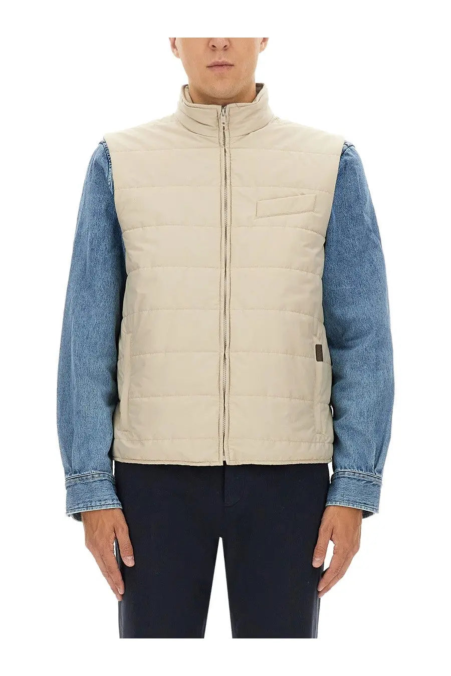 Beige Fay men’s quilted puffer vest with stand-up collar and front zipper worn over denim sleeves