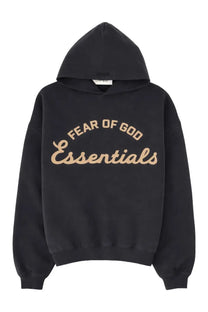 Fear of god essentials men’s black hoodie with beige cursive lettering across the chest for casual wear