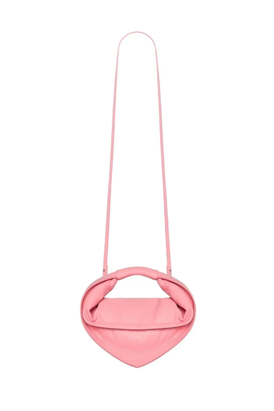 A soft pink heart-shaped crossbody bag with smooth leather finish and slender strap from federico cina womens mini tortellino bag collection