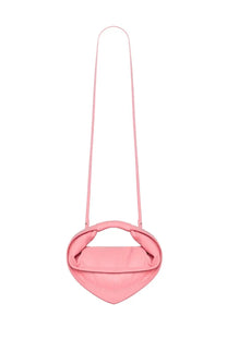 A soft pink heart-shaped crossbody bag with smooth leather finish and slender strap from federico cina womens mini tortellino bag collection