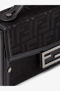 Fendi men’s baguette soft trunk crossbody bag in black woven ff fabric with leather trim and repeating logo pattern