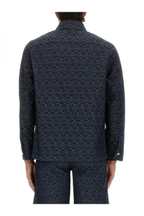 Dark blue fendi men’s ff jacquard denim jacket with repeating monogram pattern in lighter contrast stitching
