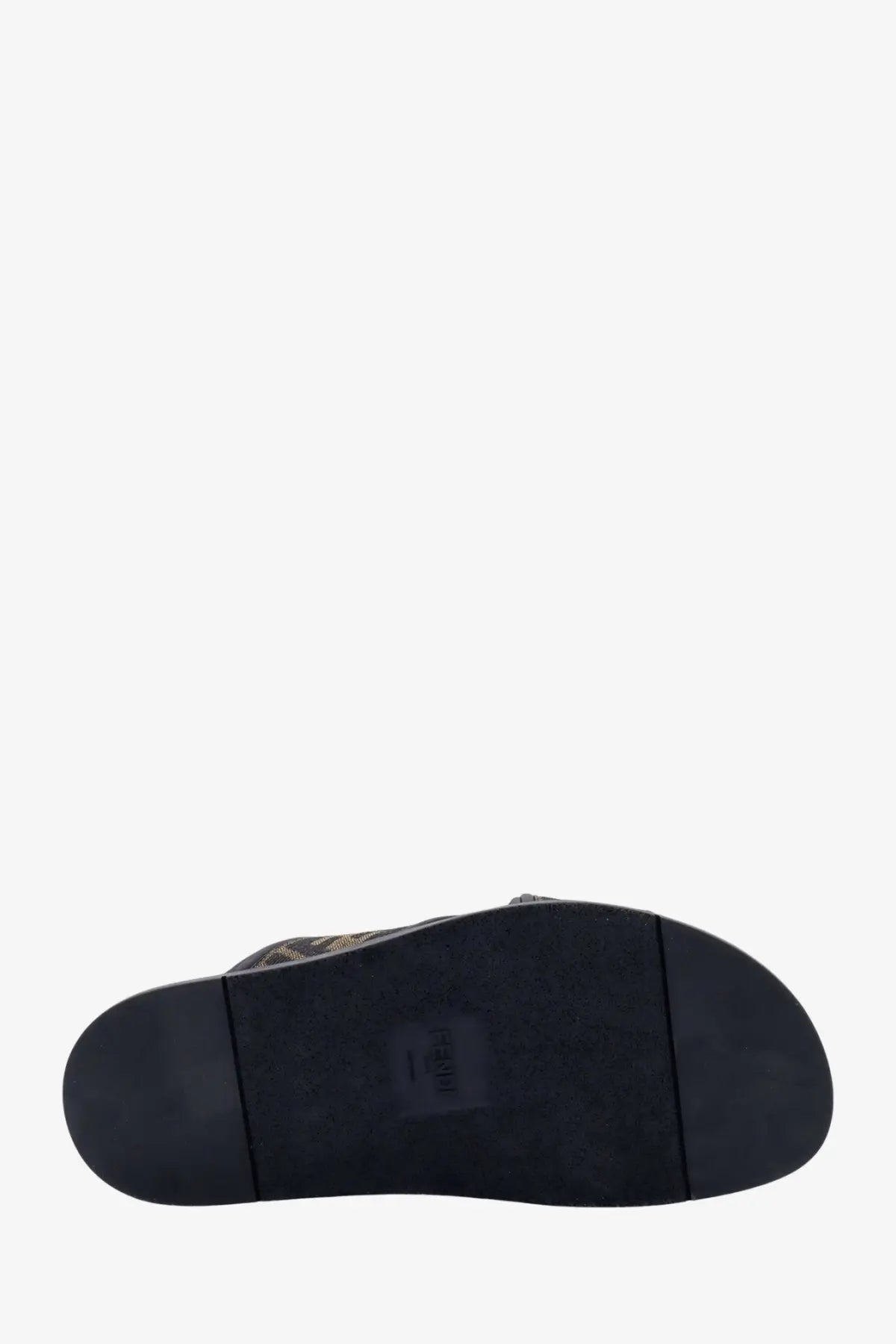 Black rubber sole with subtle textured pattern and small heel label on fendi men’s ff jacquard fabric sandals black back side